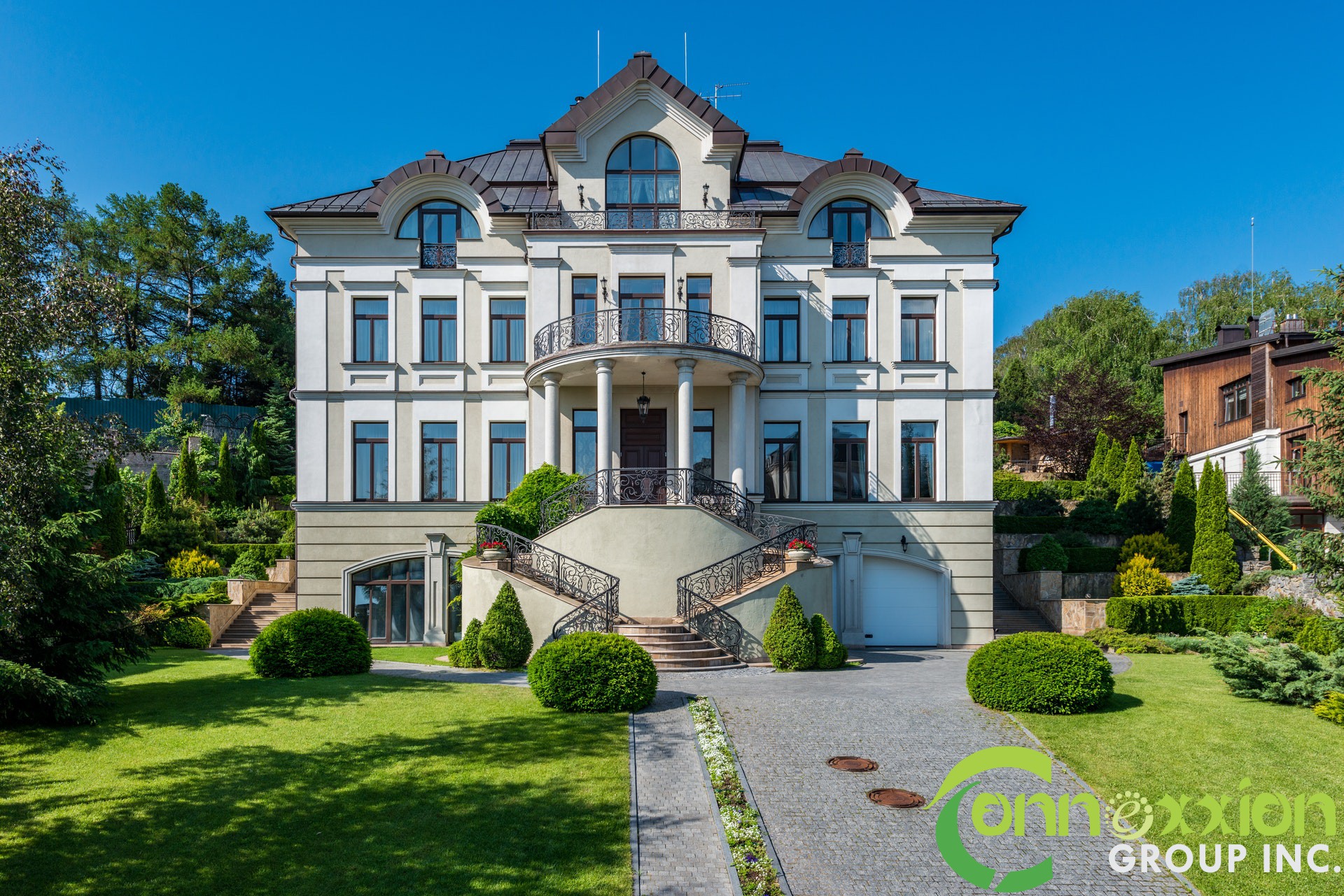 Garden with path near plants and trees near river